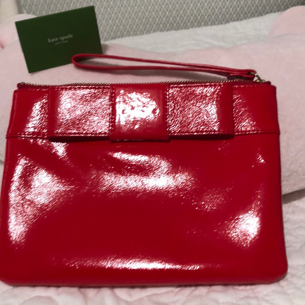 Kate Spade clutch/wristlet. New in box.